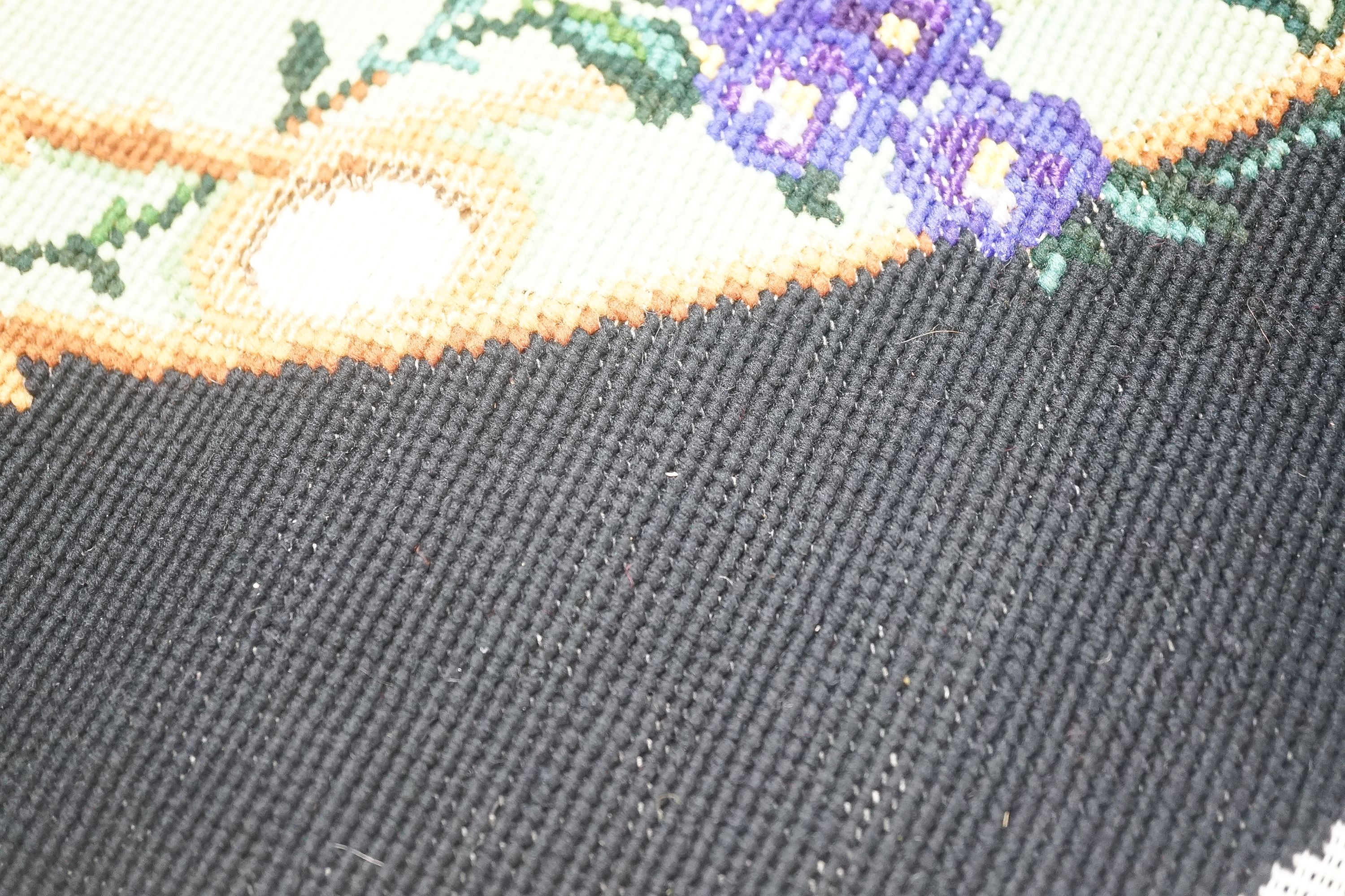 A 19th century wool worked chair seat and back and a 19th century Berlin bead worked cushion